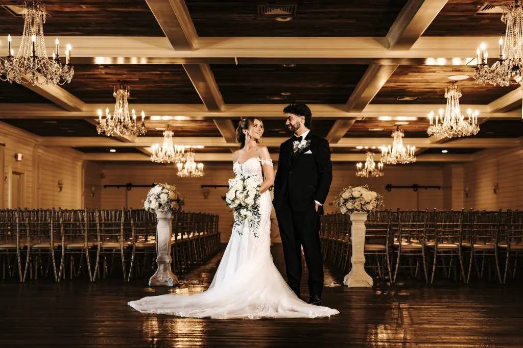 Bride and groom in ballroom at Mansion at Mountain Lakes in NJ