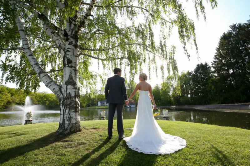 bride and groom on the grounds of Perona Farms in Andover, NJ