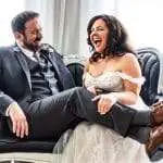 Bride laughing with groom