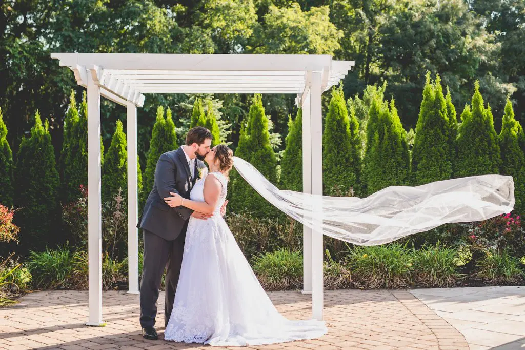 Bride and groom kissing