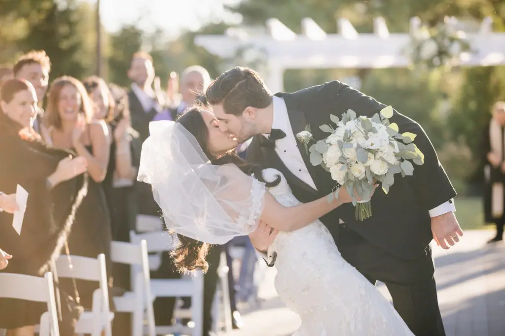 Bride and groom kissing
