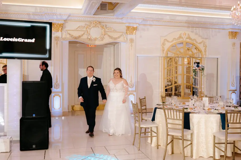 Bride and groom entering the Grand ballroom