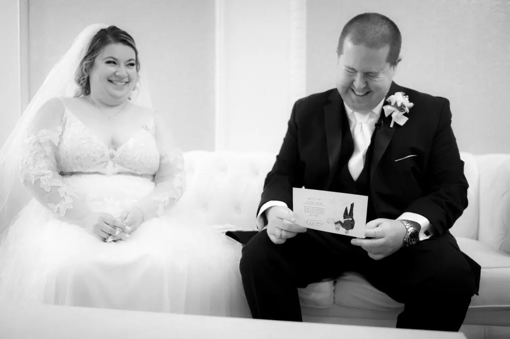Groom reading letter