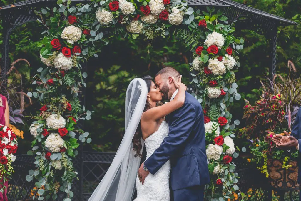 Bride and groom kissing