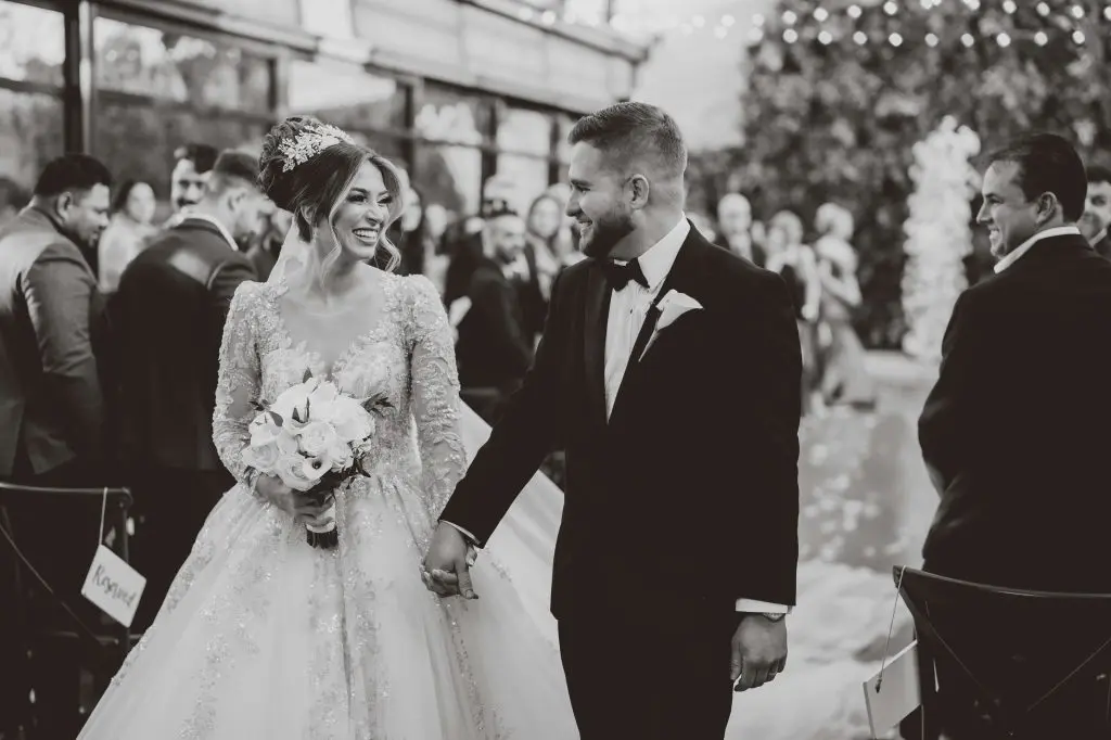 Bride and groom walking down the aisle