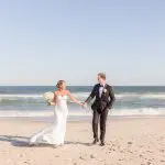 Bride and groom on beach at The Berkeley Oceanfront in Asbury Park, NJ