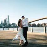 Bride and groom with NYC skyline