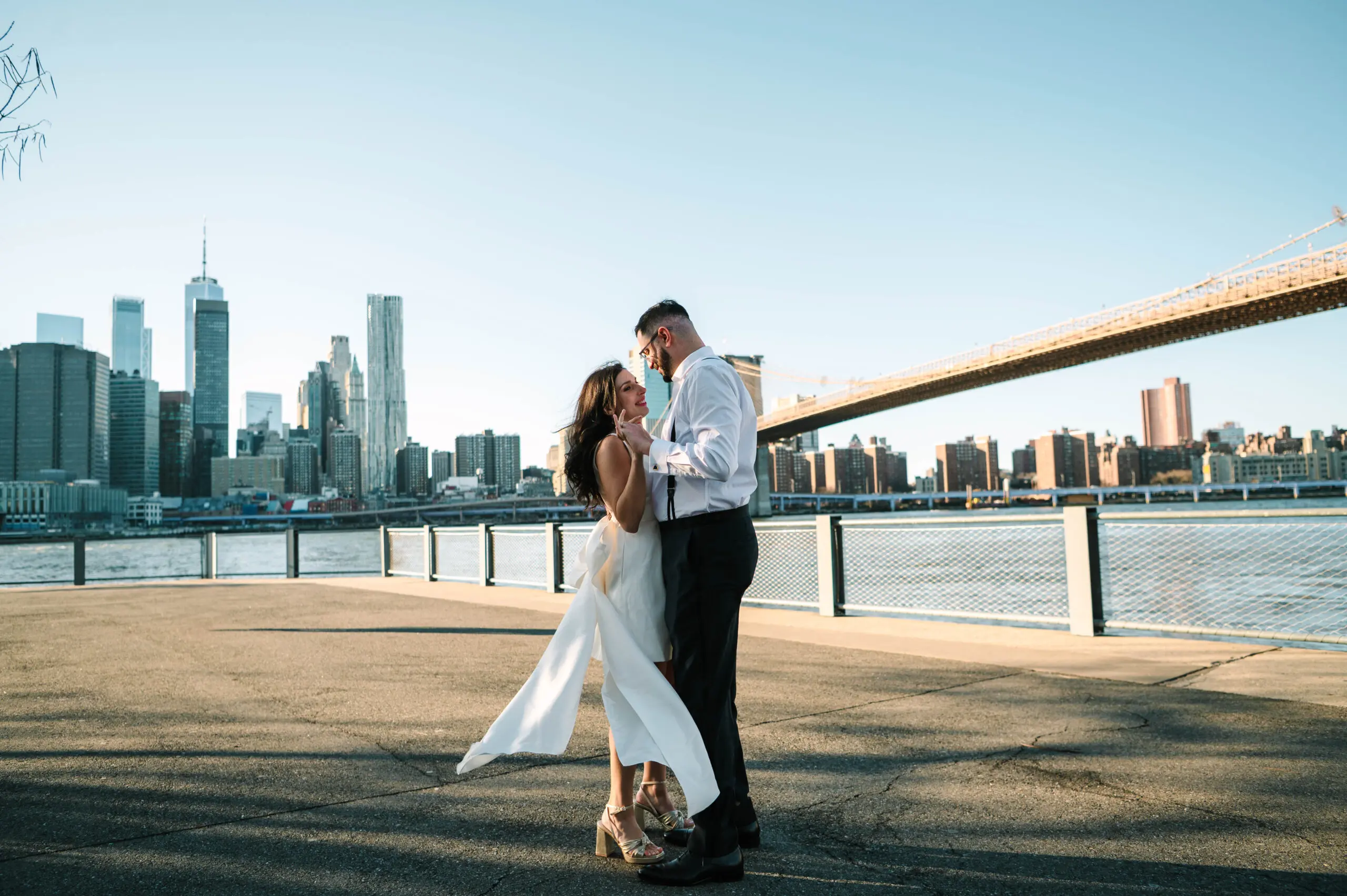Bride and groom with NYC skyline
