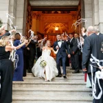 Coming the steps of the church after the wedding ceremony.