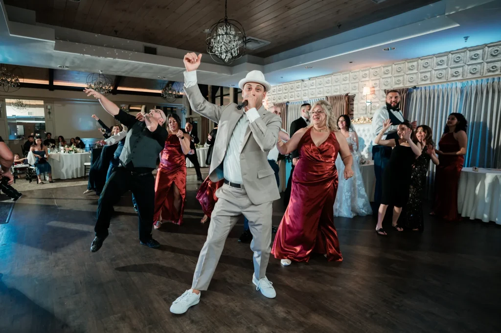 Chuck of Fresh New Angle Events on dance floor at wedding reception
