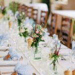 Wedding table with flowers and place settings