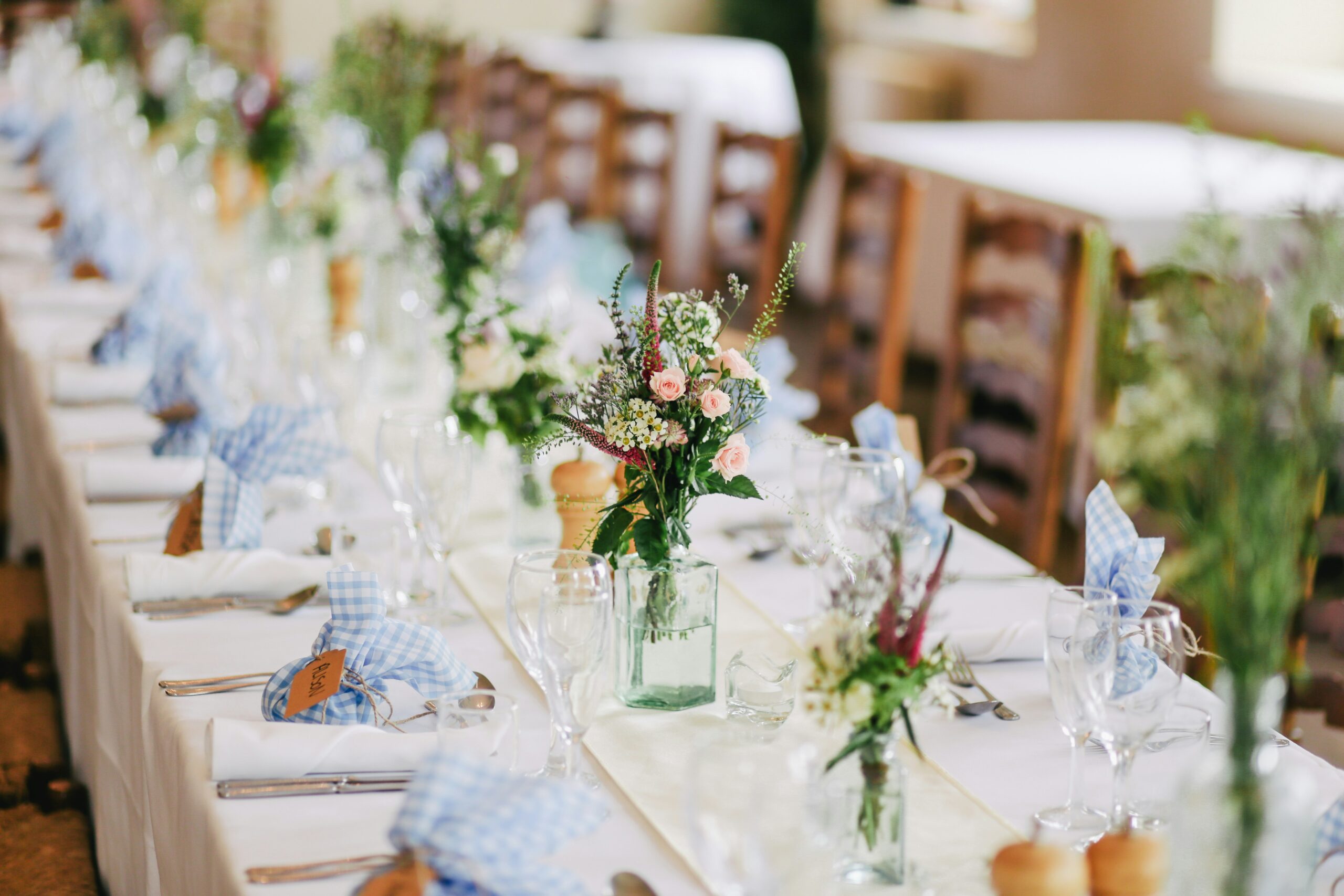 Wedding table with flowers and place settings
